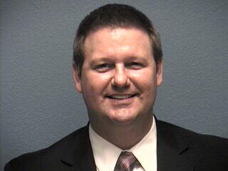 TOMLINSON NEAL PD.jpg